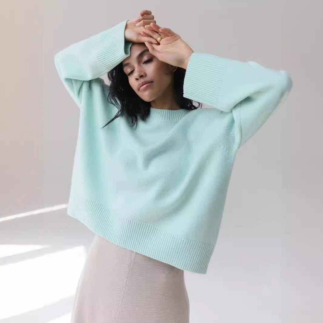 Round neck solid color loose knit sweater