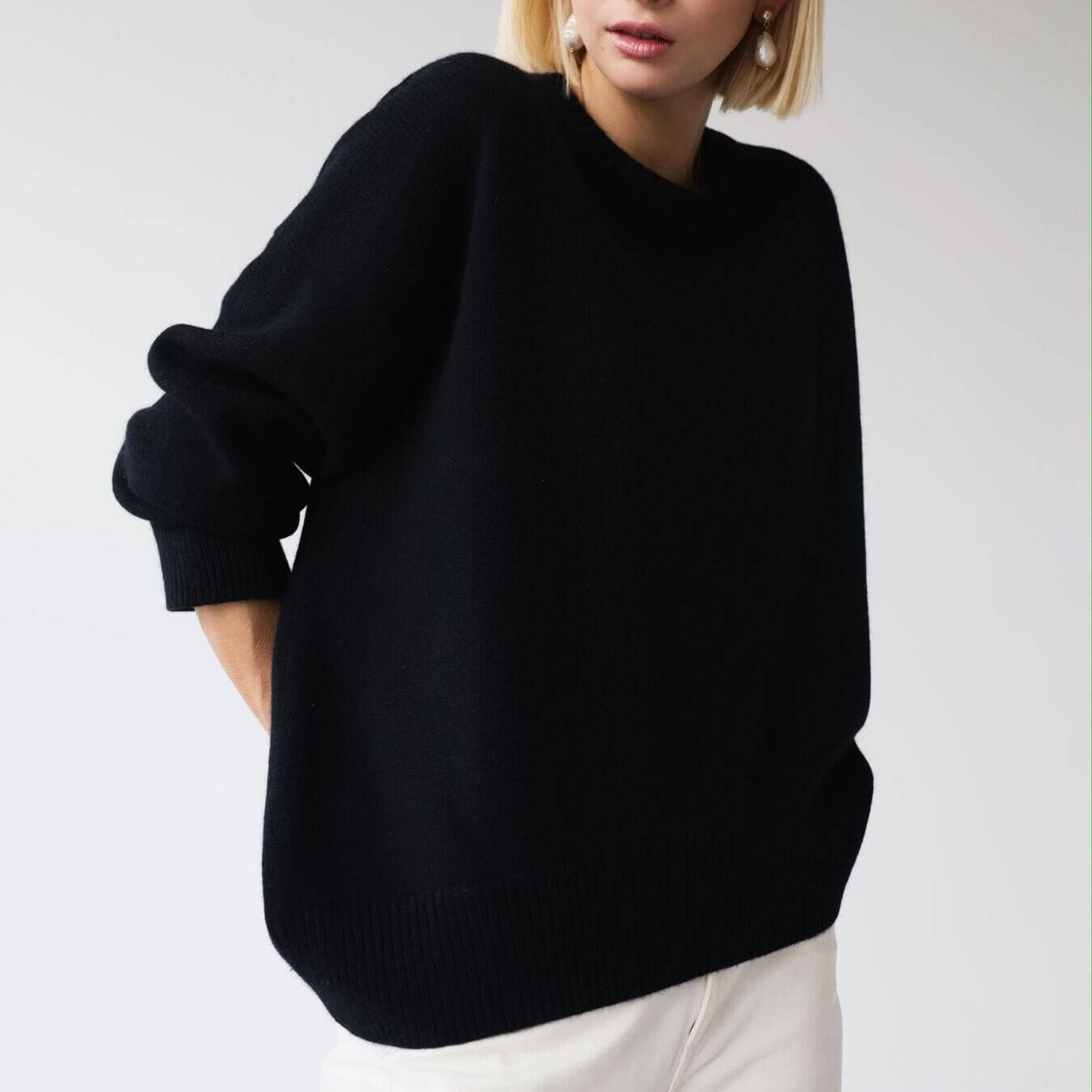 Round neck solid color loose knit sweater