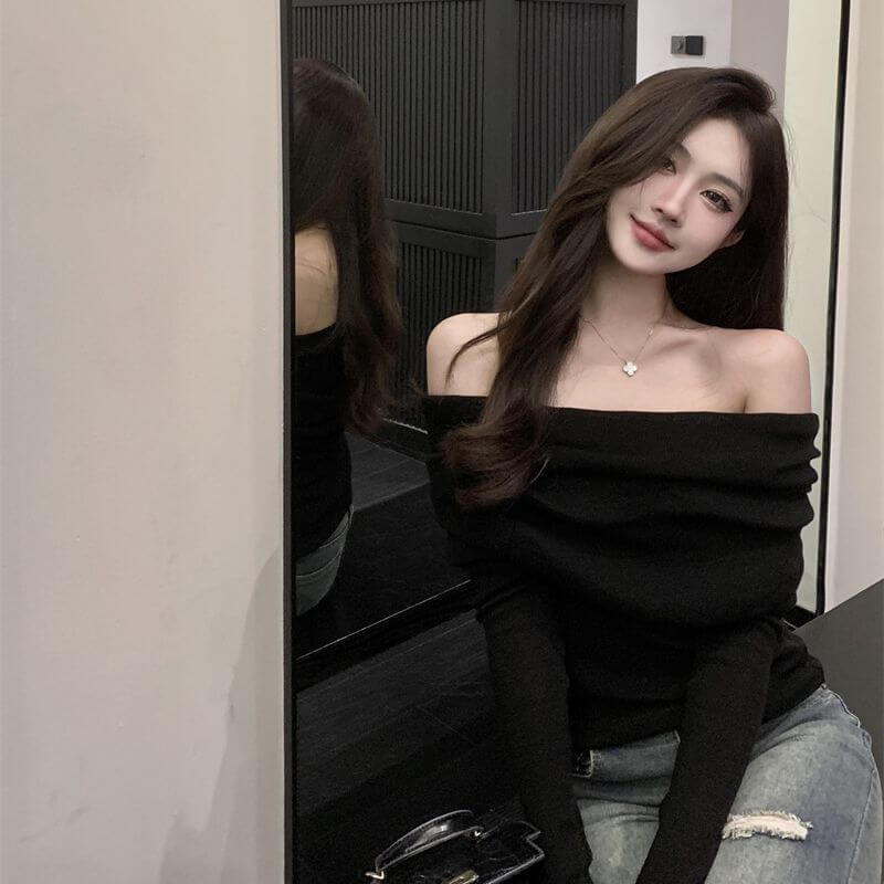 French one-shoulder collarbone-baring soft knit