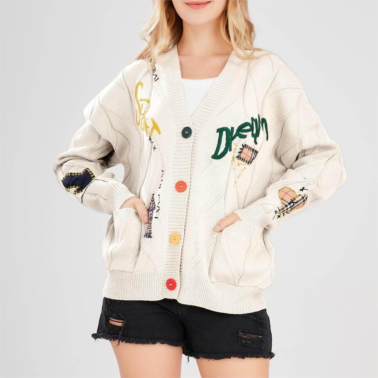 Twisted V-neck buttoned embroidered sweater