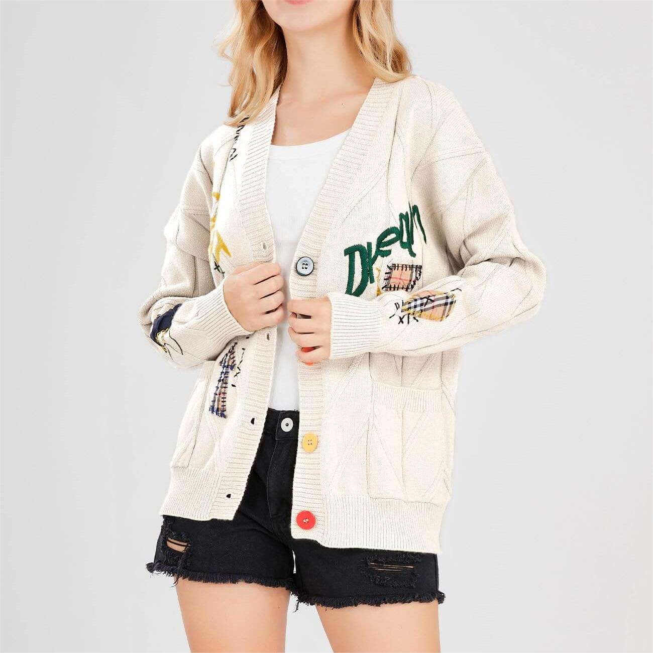 Twisted V-neck buttoned embroidered sweater