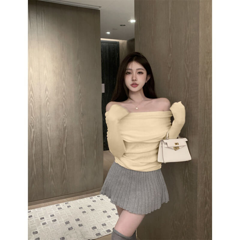 French one-shoulder collarbone-baring soft knit