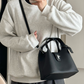 REINAREA Women's Commuter Bucket Bag - Lock Handheld Crossbody Mother and Baby Bag