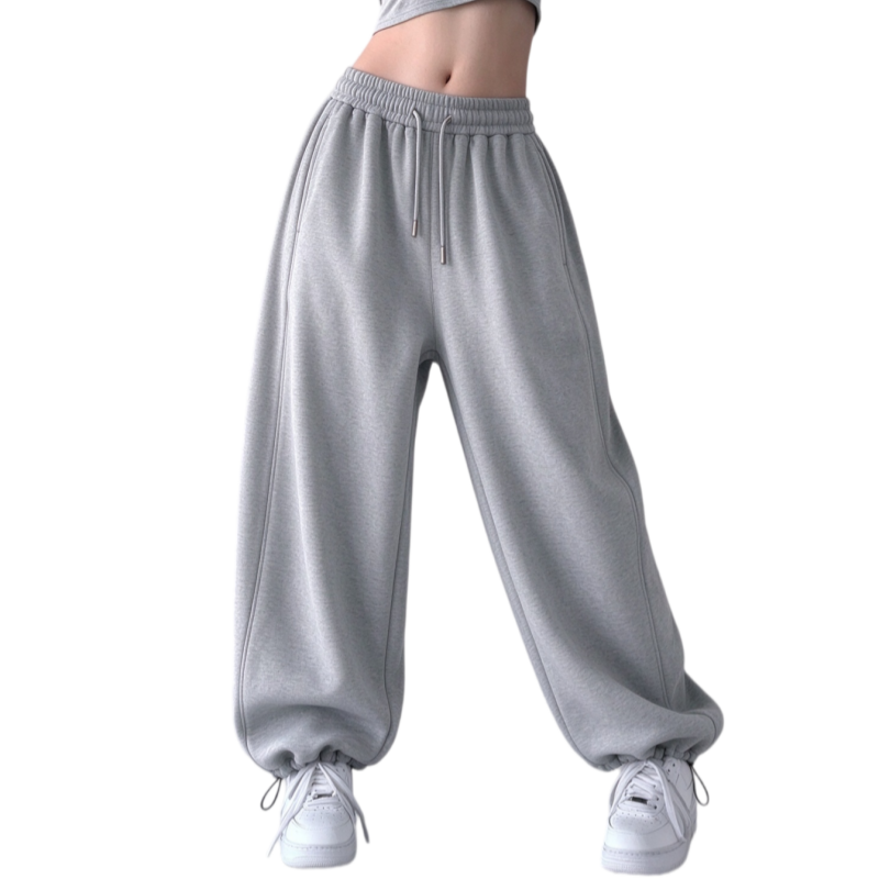 Women's fleece lined wide leg sweatpants in light gray heather featuring adjustable drawstring cuffs